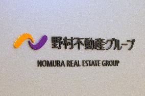 Nomura Real Estate signboard and logo